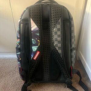Spray ground backpack